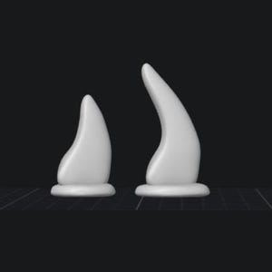May include: Two white, curved horn-shaped objects. The horns are smooth and glossy, with a rounded base. They are set against a dark background, suggesting a minimalist or fantasy theme. The horns are different sizes.