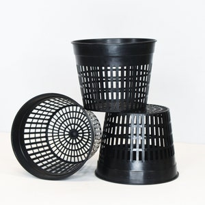 May include: Three black plastic mesh plant pots, stacked on top of each other. The pots are designed for hydroponic gardening.
