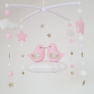 Musical mobile with the little bird couple on their wool felt cloud for the baby&#39;s room
