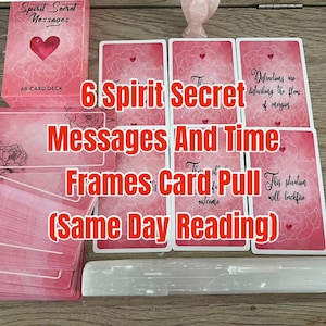 May include: A deck of "Spirit Secret Messages" cards with a pink floral design and a red heart. The image includes several cards with messages, and the text "6 Spirit Secret Messages And Time Frames Card Pull (Same Day Reading)".