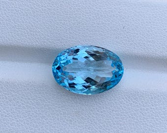Swiss Blue Topaz Gemstone: 10.30ct AAA Oval Cut, 16x11mm