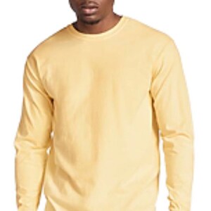 May include: A long-sleeved t-shirt in a pale yellow color. The shirt has a crew neck and a relaxed fit.