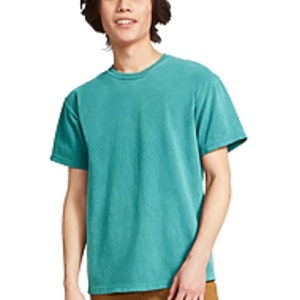 May include: A teal-colored, short-sleeved t-shirt. The shirt has a crew neck and a slightly faded appearance. The person is wearing brown pants. The background is white.