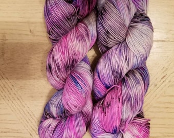 Speckled hand dyed yarn/pink,purple,blue with black specks READY TO SHIP
