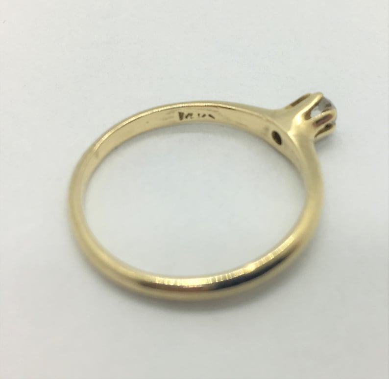 14k Yellow Gold and .12ct Round Cut Diamond Engagement Ring Size 7