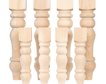 May include: Set of eight unfinished wooden table legs with a turned design. The legs are various heights and are ready to be stained or painted.