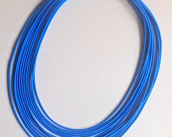 Blauwe touwketting: dikke slabketting van textiel