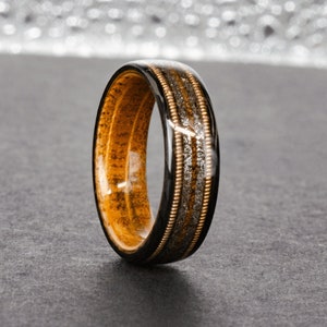 Musicians Monolith - Guitar String Whiskey Barrel And Carbon Fiber Ring, With Meteorite And Dinosaur Fossil Inlay