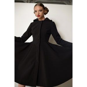 Waterproof Long Black solid color coat with large hood for women &#39;Midnight Black&#39;. Fit And Flare vintage inspired design.
