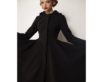 Waterproof Long Black solid color coat with large hood for women 'Midnight Black'. Fit And Flare vintage inspired design.