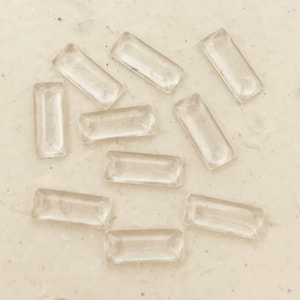 25 pcs • Rectangle Jeweler's Glass • 10x25mm Clear Cabochons