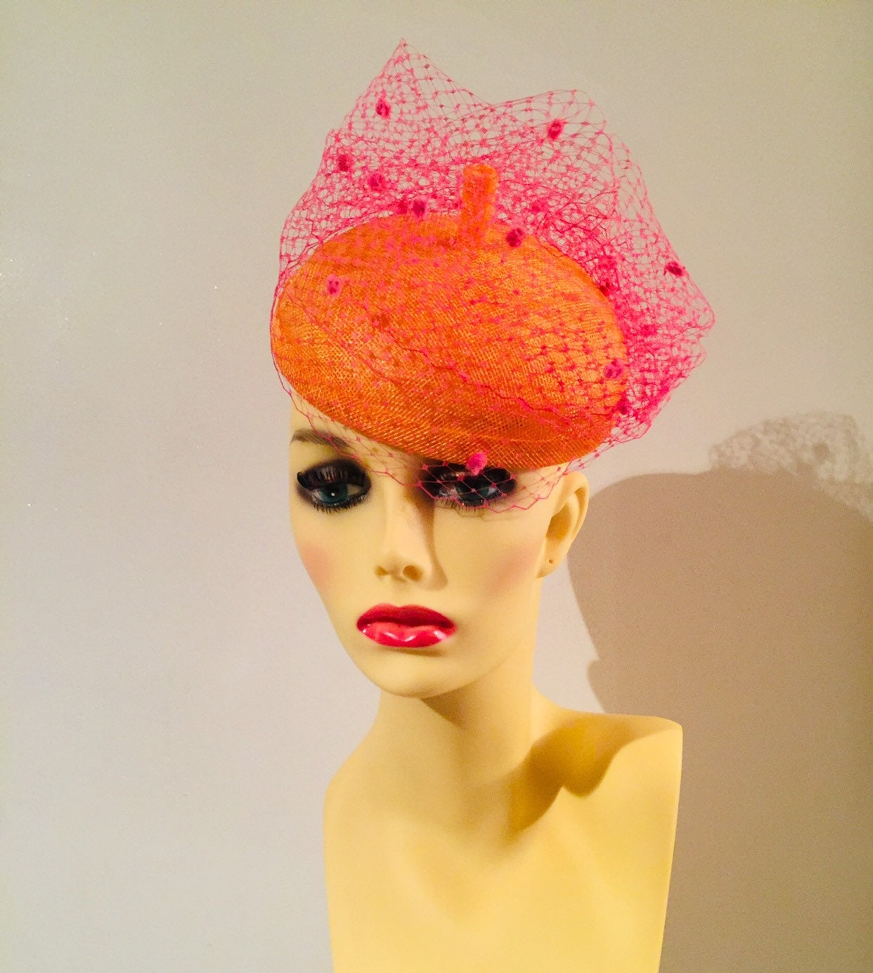 A Bright Orange Button Hat Fascinator 