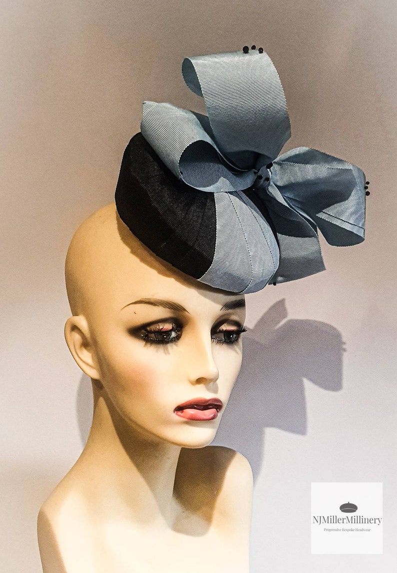 Duck egg blue and black pleated ribbon button hat with bow