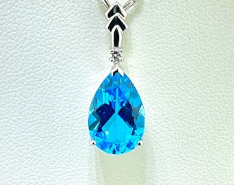 14k White Gold Blue Topaz and Diamond Pendant