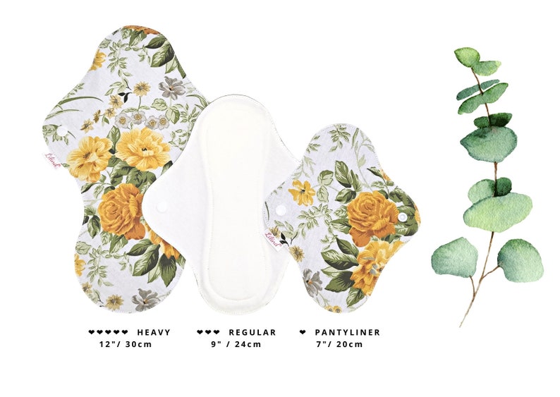 May include: Three reusable cloth menstrual pads in a floral print with yellow roses. The pads are labeled "Heavy" (12 inches / 30 cm), "Regular" (9 inches / 24 cm), and "Pantyliner" (7 inches / 20 cm).