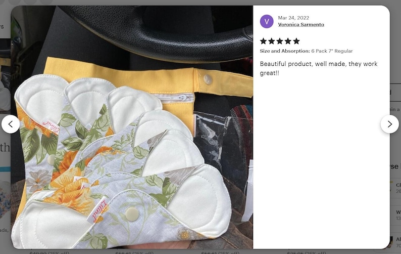 May include: Six reusable cloth menstrual pads with a floral print and white absorbent inserts. The pads are arranged in a stack and have a yellow fabric pouch behind them.