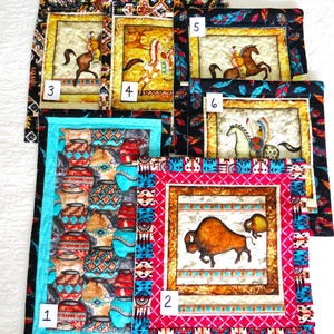 May include: A collection of six small, quilted wall hangings with Native American themes. The hangings feature images of pottery, bison, and Native Americans on horseback. Each piece has a decorative border in various colors and patterns.