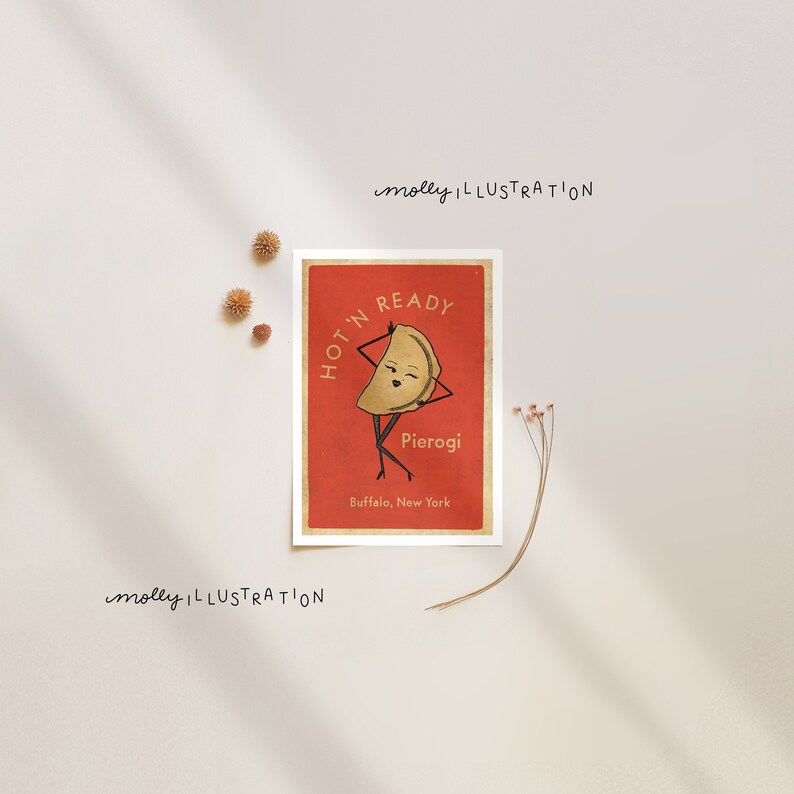 May include: A red and white illustration of a pierogi with a face and arms. The pierogi is standing on its feet and has its arms raised in the air. The text "HOT 'N READY" is written in a circle around the pierogi. The text "Pierogi" is written below the pierogi. The text "Buffalo, New York" is written below the text "Pierogi".