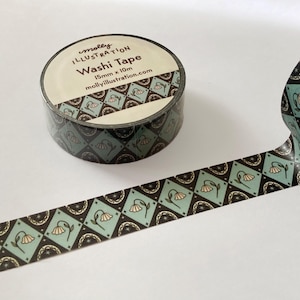 May include: A roll of washi tape with a black and teal floral pattern. The tape is 15mm wide and 10m long. The label on the tape reads "molly illustration Washi Tape 15mm x 10m mollyillustration.com".