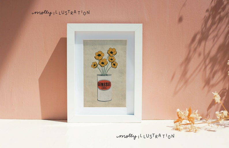 May include: A framed illustration of a can of Genesee beer with yellow flowers in it. The background is a light brown color. The text "molly ILLUSTRATION" is at the top and bottom of the image.