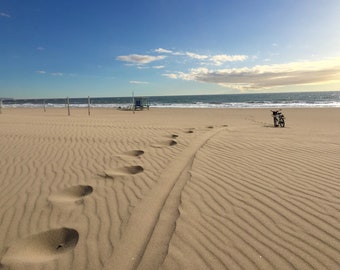 Footsteps in the Manhattan Beach Sand
