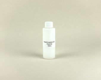 May include: A white plastic bottle with a white cap containing Yamato Indigo Dye Fixative, 100ml.