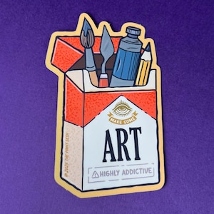 K&ouml;nnte beinhalten: Ein Aufkleber mit einem stilisierten Zigarettenpackungsdesign, gef&uuml;llt mit Kunstbedarf. Die Packung ist rot und wei&szlig;, mit dem Wort "ART" in fetten Buchstaben. Der Text "MAKE SOME" und "HIGHLY ADDICTIVE" sind ebenfalls sichtbar.