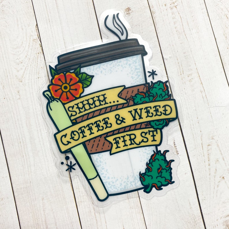 May include: A sticker with a cartoon illustration of a coffee cup, a joint, and the text "Shhh... Coffee & Weed First".