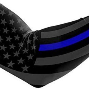 May include: Black and gray arm sleeve with a thin blue stripe and an American flag pattern. The sleeve has the letter "E" in a white circle on the upper arm.
