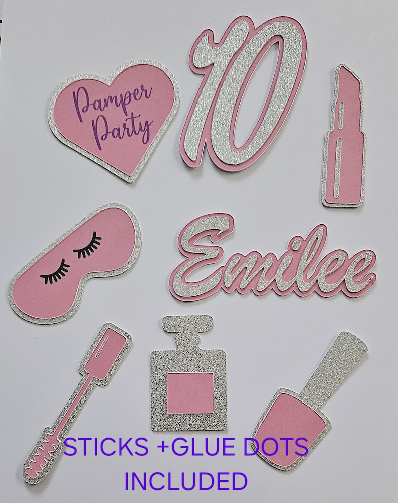 May include: Pink and silver glitter paper cutouts for a pamper party. The cutouts include the number 10, a heart with the text "Pamper Party", a lipstick, a sleep mask, the name "Emilee", a perfume bottle, a nail polish bottle, and a mascara wand. The text "STICKS + GLUE DOTS INCLUDED" is also included.