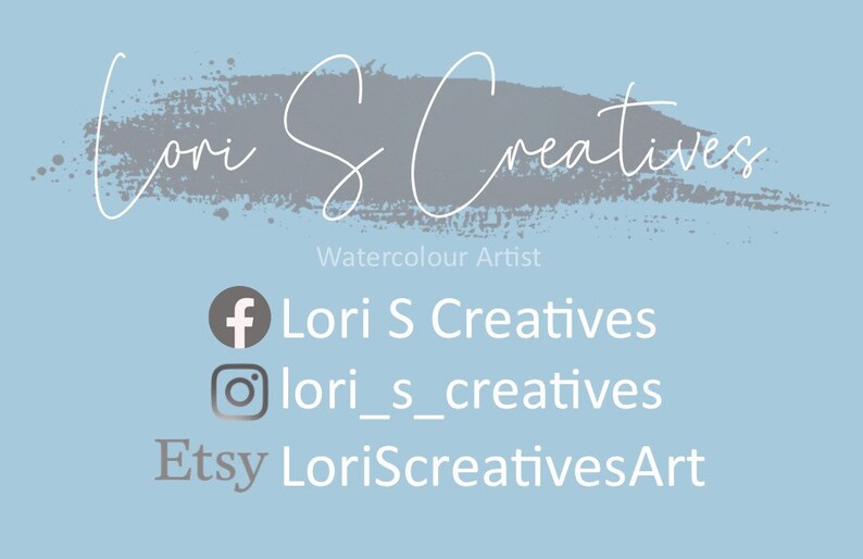 May include: A blue and grey watercolour art business card with the text "Lori S Creatives" and the words "Watercolour Artist". The card also includes social media icons for Facebook, Instagram, and Etsy with the corresponding usernames: Lori S Creatives, lori_s_creatives, and LoriScreeativesArt.