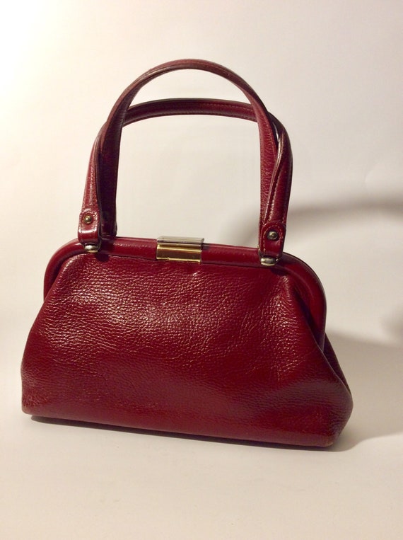 oxblood leather handbag