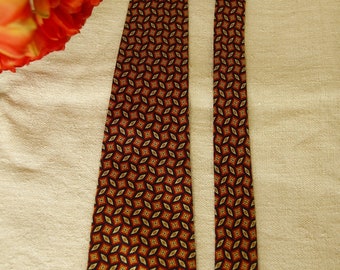 Vintage Azzaro tie - 100% pure silk - super soft - Small delicate red and gold patterns on a navy blue background - Made in France