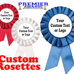 May include: Three custom rosettes with ribbons. The rosettes are red, white, and blue. Each rosette has a white circle in the center with the text "Your Custom Text or Logo".