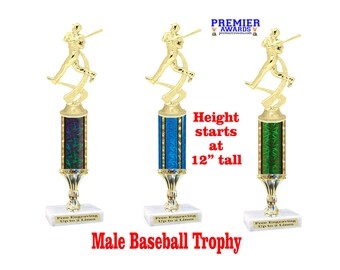 May include: Gold baseball trophy with a male baseball player figurine on top. The trophy has a column base with a green, blue, or black marble design. The trophy is 12 inches tall and includes free engraving up to 2 lines. "Height starts at 12" tall" and "Male Baseball Trophy" are written in red text below the trophies.