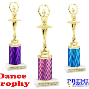 May include: Three gold ballerina dance trophies with iridescent purple, pink, and blue bases. Each base has a white marble base and the text "Free Engraving Up to 2 Lines".