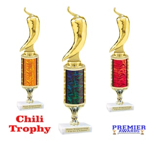 May include: Three gold chili pepper trophies with different colored bases. The bases are orange, black and green, and red. Each trophy has a white base with the text "Free Engraving Up to 2 Lines".