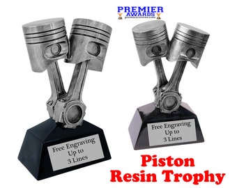 May include: Silver piston resin trophy with a black base. The base has the text "Free Engraving Up to 3 Lines".