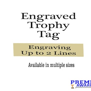 May include: White background with the text "Engraved Trophy Tag". Below, a tan banner reads "Engraving Up to 2 Lines". The text "Available in multiple sizes" is below the banner. The Premier Awards logo is at the bottom.