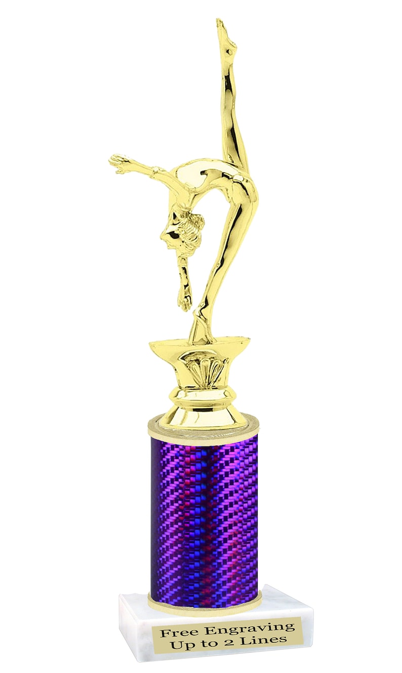 May include: Gold-colored trophy with a gymnast figurine on top. The base is a purple cylinder with a white marble base. The base has the text "Free Engraving Up to 2 Lines".