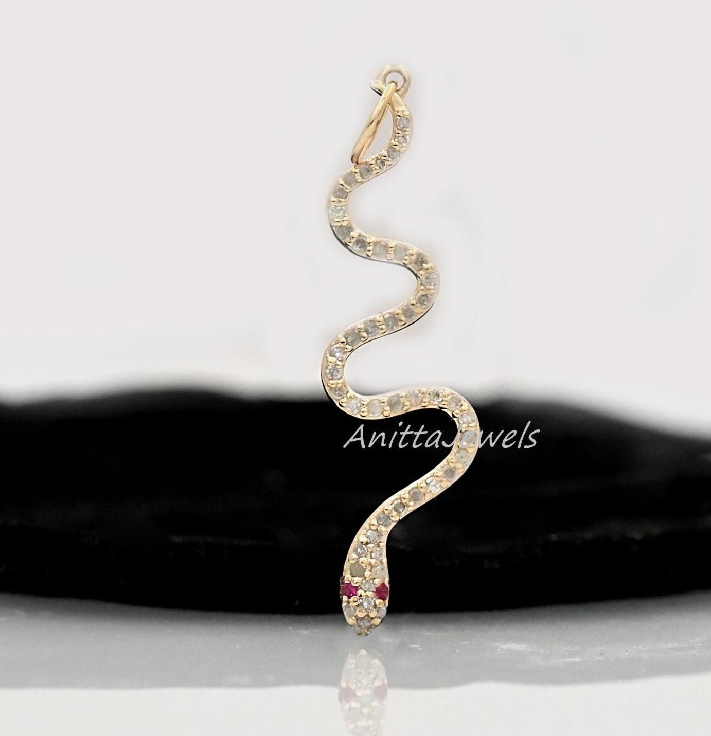 Ciondolo a forma di serpente in oro 14 carati con diamanti