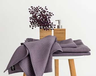 Waffle linen bath towels in plum. Washed linen hand towels