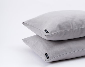 Light grey linen pillowcase with an envelope closure. Stonewashed gray linen pillow sham