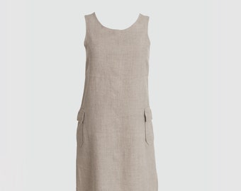 Sleeveless, knee-length linen dress with side pockets