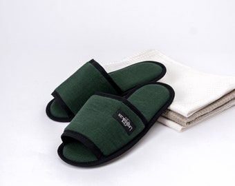 Dark green linen indoor or bath slippers. Lightweight hotel, travel, disposable guest slippers