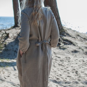 Loose fitted linen summer dress with 3/4 sleeves and pockets