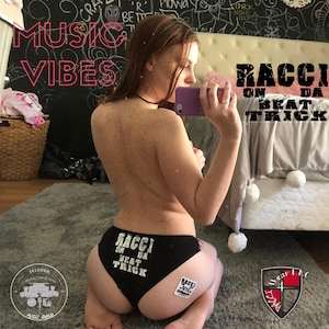 May include: Black underwear with white text that reads "Racci on da beat trick".