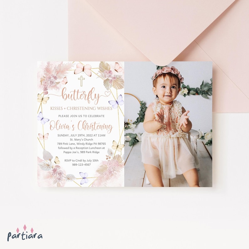 May include: A pink and gold christening invitation with a butterfly theme. The invitation features a photo of a baby girl, a cross, and the text "butterfly kisses + christening wishes".