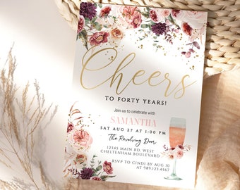 May include: A white invitation with gold lettering that reads "Cheers to Forty Years!"  The invitation features a floral design with pink, burgundy, and peach flowers. The text also includes the name "Samantha", the date "Sat Aug 27 at 1:00 PM", the location "The Revolving Door", the address "12345 Main Rd. West Cheltenham Boulevard", and RSVP information.