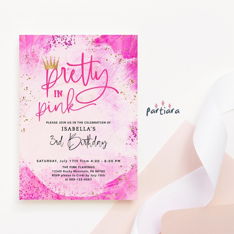May include: Pink and gold birthday invitation with the text "Pretty in Pink" and a crown. The invitation is for Isabella's 3rd birthday party. The party is on Saturday, July 17th from 4:00 to 6:00 PM at The Pink Flamingo, 12345 Rocky Mountain, PA 98765. RSVP to Cindi by July 10th at 989-123-4567.